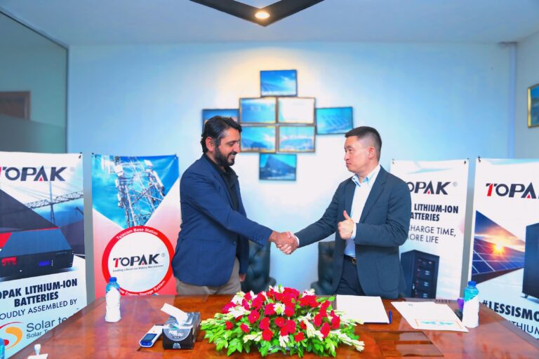 CEO Shking hand with Chinese representative